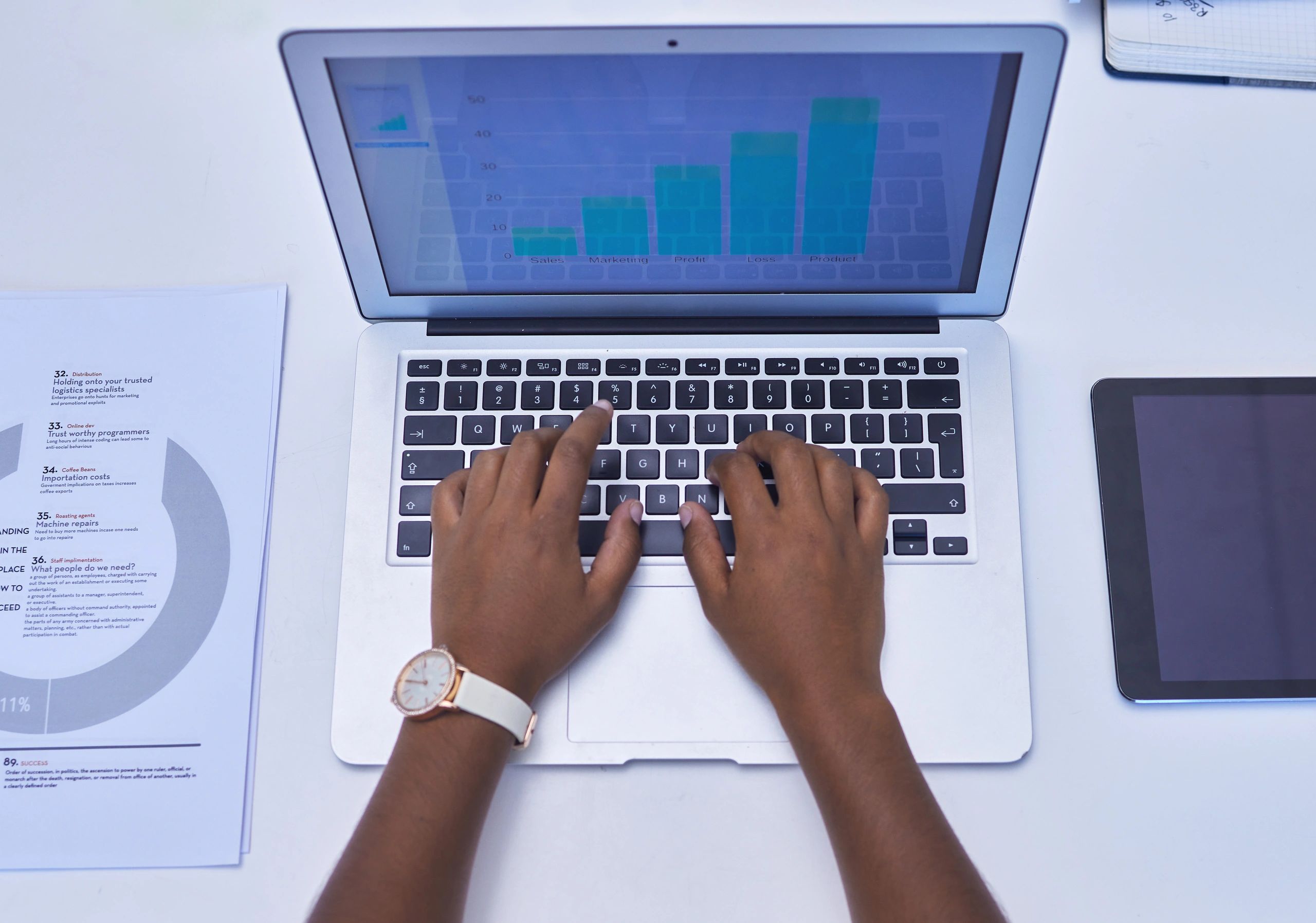 Business owner working on marketing from a laptop