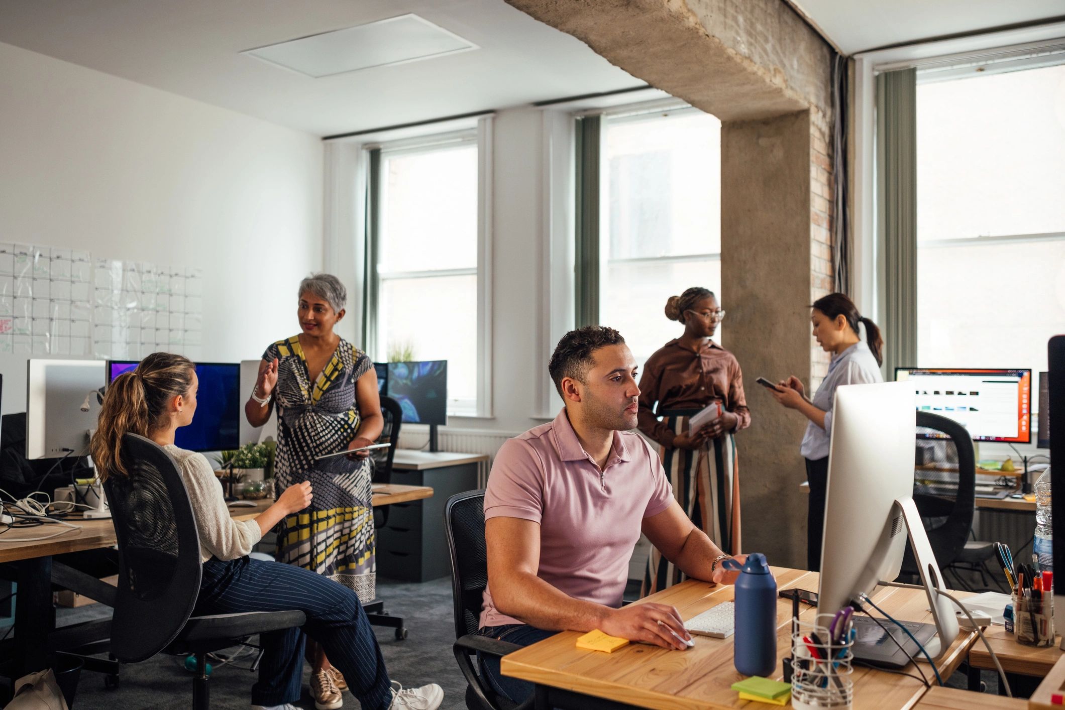 Marketing team working together in an office